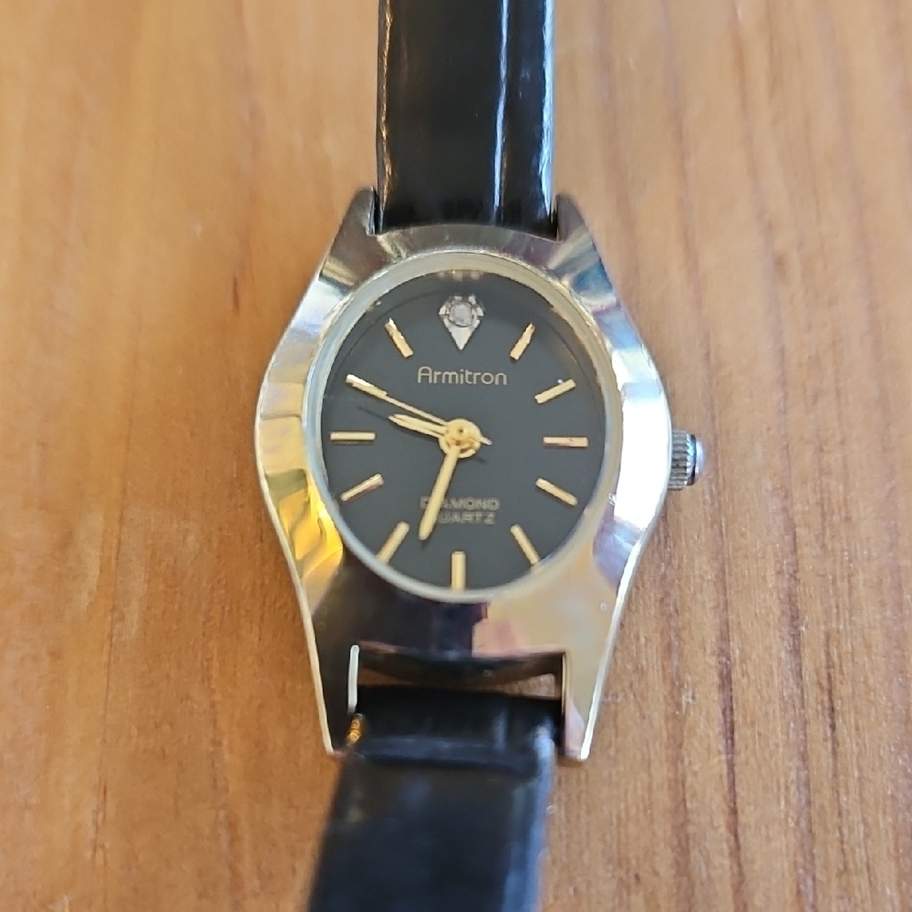 Ladies Armitron Diamond Dress Oval Gold Tone Case Black Leather Watch
